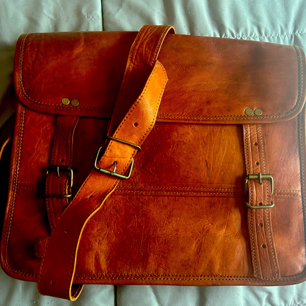 Never used vintage look handmade leather crossbody bag.